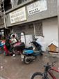 Binadan dökülen parçalar aşağıdaki motosikletlere zarar verdi